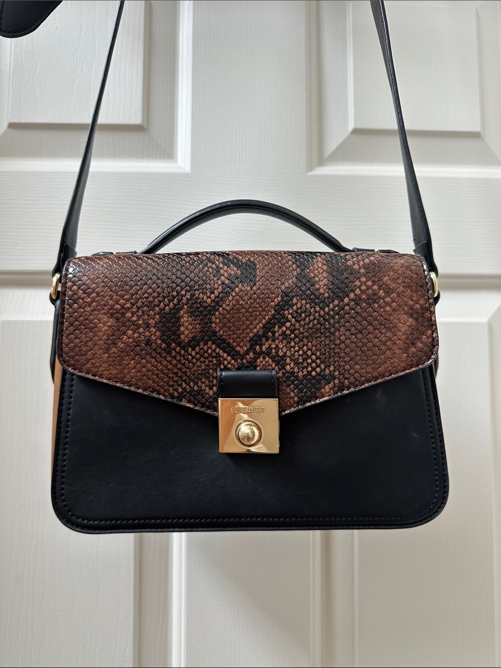 Nine West Black Satchel with Brown Snake-Print Flap and Gold Hardware